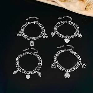Double-layered stainless steel bracelet set with cherry and butterfly charm pendants