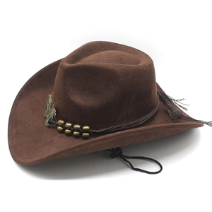 Detail of brown suede cowboy hat with bronze butterfly charms and long side tassels