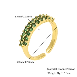 Detail shot of 18K gold plated copper ring with two rows of green zircon stones