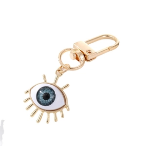 Gold plated evil eye keychain with blue resin eye pendant and sparkling rhinestones