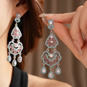 Vintage teardrop tassel earrings with blue beads and pink crystals in silver palace style