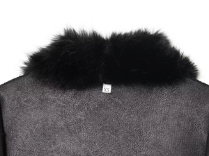 Detail shot of winter faux fur coat showing deep grey suede fabric and size XS label