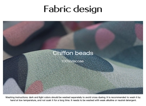 Macro shot of colorful geometric print on 100% viscose chiffon beads fabric detail