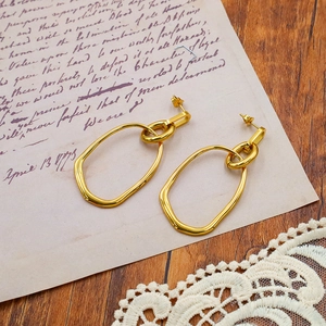 Minimalist gold oval titanium steel earrings with a dual interlocking loop design
