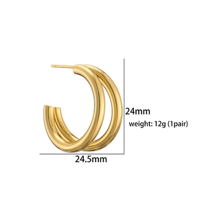 Detail view of gold hollow C-shape earrings with dimensions 24mm by 24.5mm and 12g weight