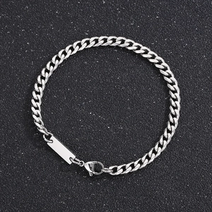 Close-up of silver stainless steel Cuban chain with square plate and lobster clasp