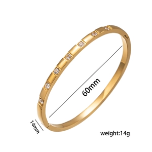 Elegant gold stainless steel bangle with zircon stones and product size measurements