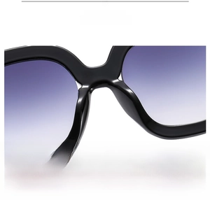 Detail view of large frame sunglasses featuring integrated flexible anti-allergy nose pads