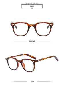 Detail view of tortoiseshell optical frames with vintage rivets and side temple design