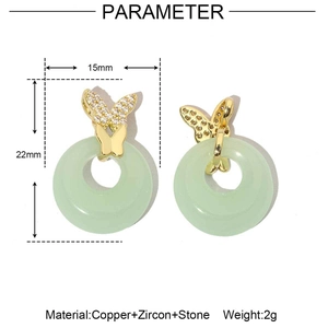Detalle de pendientes mariposa de oro de 18k con piedra verde y medidas