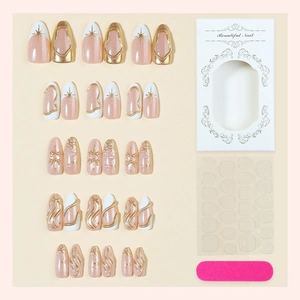 30 faux ongles amande oeil de chat avec accents dorés 3D et perles dans leur boîte