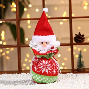 Knitted Christmas gift bag with Santa Claus 3D design and snowflake patterns