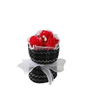 Handmade red rose soap flower bouquet wrapped in black tweed with a white ribbon bow