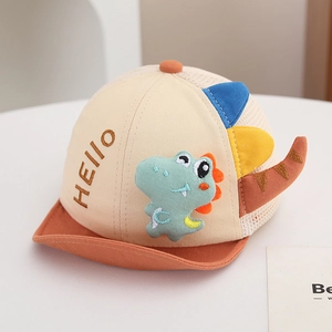 Detail of baby sun hat with green dinosaur patch and breathable white mesh back