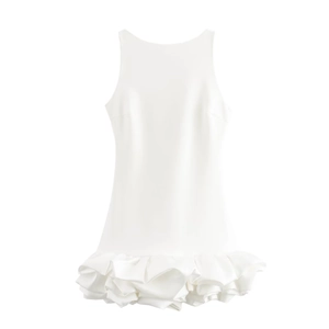 Detail of the layered ruffle hem and smooth satin finish on the white sleeveless dress