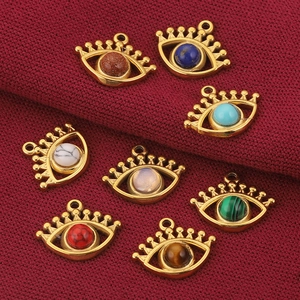 Eight gold bohemian stainless steel evil eye pendants with various natural gemstones