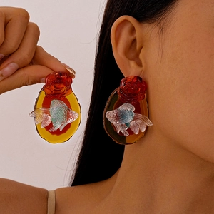Vintage resin flower and goldfish geometric earrings with a translucent amber finish