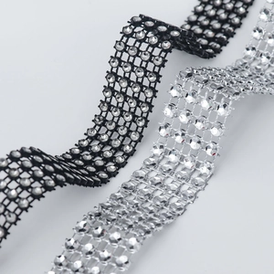 Close-up of black and silver 24-row faux diamond mesh ribbon for DIY wedding decor