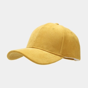 Side view of yellow suede baseball cap showing fine texture and 6-panel stitching detail