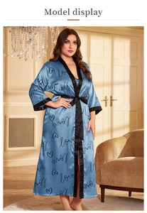 Detail of blue satin robe with love print and contrast black piping for women