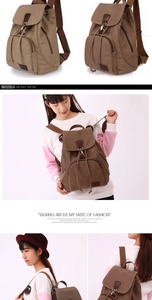 Close-up of vintage canvas backpack with drawstring closure and magnetic flap details