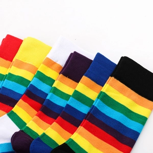 Detailed view of colorful rainbow striped crew socks made of soft cotton blend knit