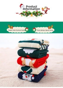 Detailed stack of five thick thermal Christmas socks with reindeer and Santa patterns