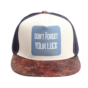 Distressed snapback cap with navy blue panels and brown vintage textured flat brim