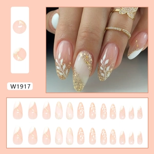 Press-on almond nails with white hand-painted leaves, gold glitter and French tip style