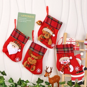 Set of 4 red Christmas stockings with 3D Santa, reindeer, bear and snowman designs