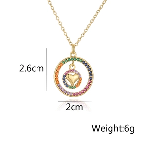 Detail view of heart pendant necklace with rainbow zircon inlay and 18K gold plating