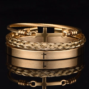 Three-piece gold stainless steel bracelet set with cross charm and Spanish prayer engraving