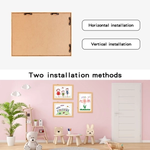 Detail showing dual horizontal and vertical wall mounts on a wooden kids art frame