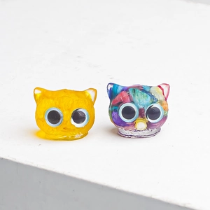 Pair of handmade resin cat figurines with natural crystals and colorful gem chips