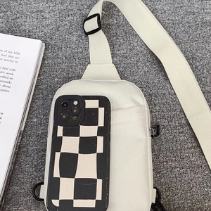 Minimalist white canvas chest bag with adjustable strap and front pocket for sports