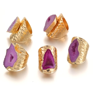Five-piece set of handmade hammered gold rings with natural purple druzy agate crystals