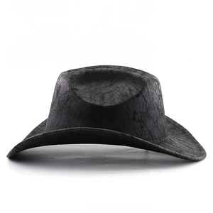 Close-up of black western cowboy hat featuring vintage cracked faux leather texture