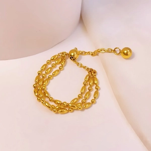 Elegant multi-layer gold bead chain bracelet with adjustable sliding toggle closure