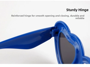 Close-up of the sturdy reinforced hinge on these stylish blue heart-shaped sunglasses