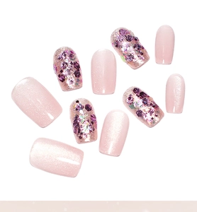 Pink cat eye glitter press-on nails with purple laser sequins and short square shape