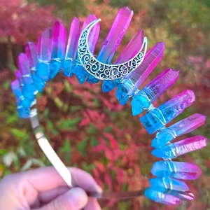 Detailed close-up of a pink and blue quartz wicca crown with an engraved silver crescent moon