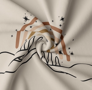 Detailed view of the soft beige bohemian tapestry featuring hand and star print patterns