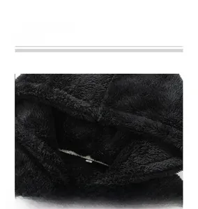 Detail view of the plush fleece hoodie neckline featuring a stitched size S label