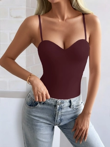 Close-up detail of burgundy Y2K tube top vest with thin straps on a fashion model