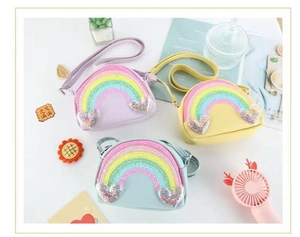 Detail of colorful rainbow sequin crossbody bags for kids in pastel macaron colors
