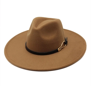 Close-up of wool fedora with heart-shaped crown and black leather belt gold buckle