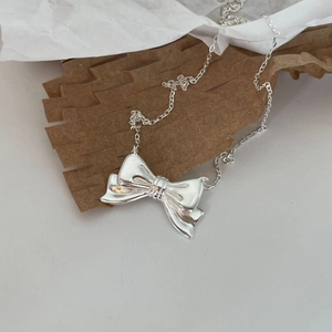 Minimalist 925 sterling silver bow pendant necklace with shiny polished metal chain