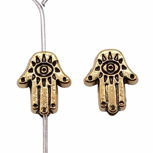 Antique gold Hamsa Hand charms with eye motif for vintage jewelry making