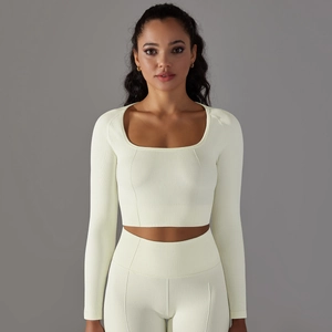 Close-up of ribbed texture and square neckline on cream yoga long sleeve crop top