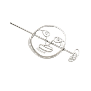 Modern hollow metal face hair pin in silver finish with minimalist abstract line art design